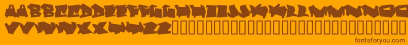 Dortmund-fontti – ruskeat fontit oranssilla taustalla