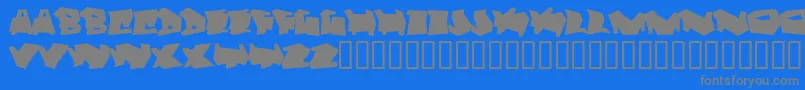 フォントDortmund – 青い背景に灰色の文字