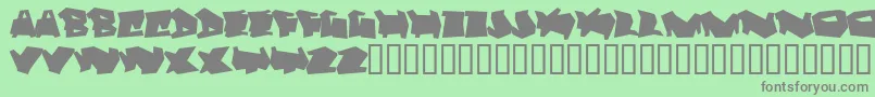 フォントDortmund – 緑の背景に灰色の文字