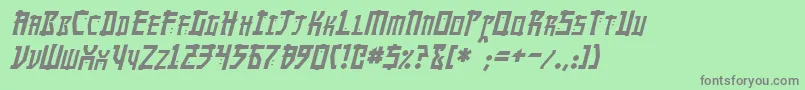 MangaItalic-fontti – harmaat kirjasimet vihreällä taustalla