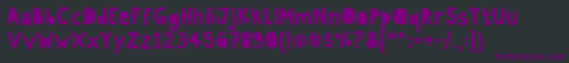Czcionka Paperland – fioletowe czcionki na czarnym tle