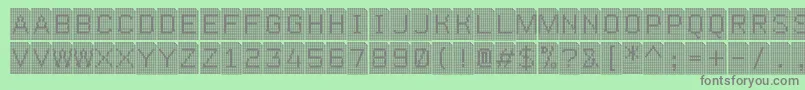 Perfocard4f-fontti – harmaat kirjasimet vihreällä taustalla