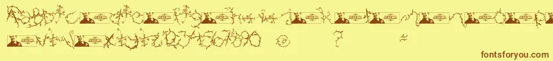 フォントFtfIndonesianaIsland – 茶色の文字が黄色の背景にあります。