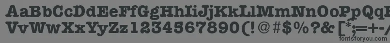 ModerntypewriterBold-fontti – mustat fontit harmaalla taustalla