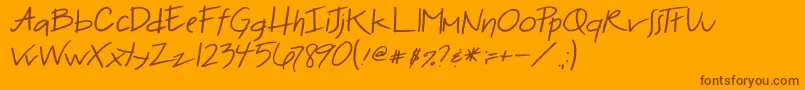 Fonte 2peasBadHairDay – fontes marrons em um fundo laranja