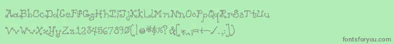 フォントLikecockatoosbold – 緑の背景に灰色の文字