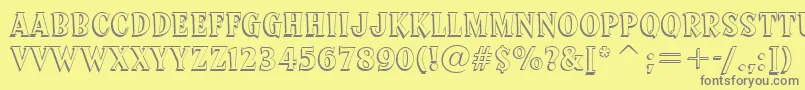 SprocketDeluxeBt-fontti – harmaat kirjasimet keltaisella taustalla