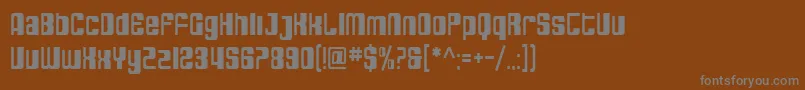 Czcionka SfDecotechnoCondensed – szare czcionki na brązowym tle