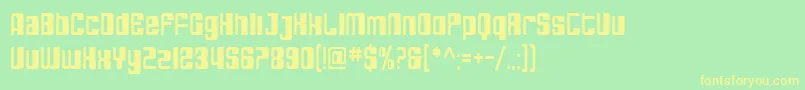 SfDecotechnoCondensed-fontti – keltaiset fontit vihreällä taustalla