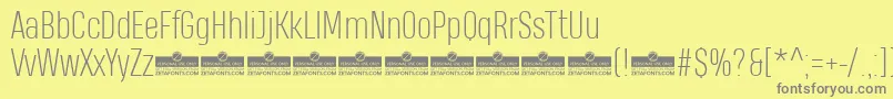 HeadingProExtralightTrial-fontti – harmaat kirjasimet keltaisella taustalla
