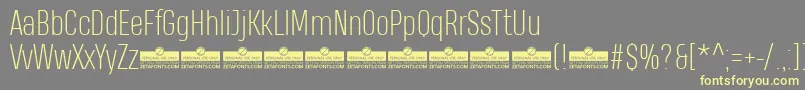 HeadingProExtralightTrial Font – Yellow Fonts on Gray Background