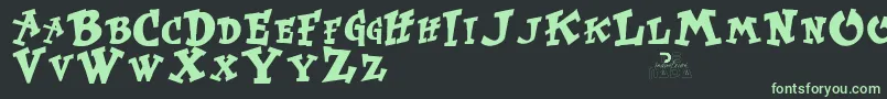 フォントKurtruss – 黒い背景に緑の文字