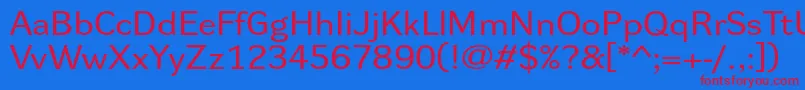 Dynagroteskrxe Font – Red Fonts on Blue Background