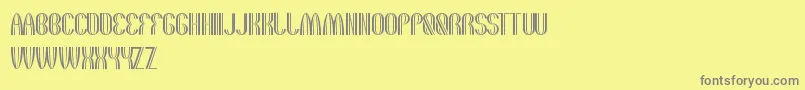 TheQuickMotorcross Font – Gray Fonts on Yellow Background