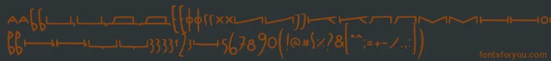 Шрифт FoxtypefaceRidjirep – коричневые шрифты на чёрном фоне