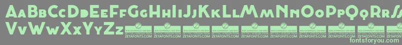 CocosignumMaiuscolettoHeavyTrial Font – Green Fonts on Gray Background