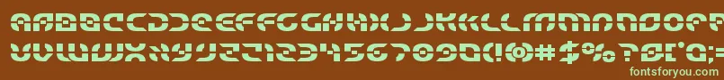 フォントStarfighterbold – 緑色の文字が茶色の背景にあります。