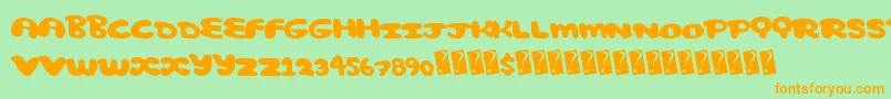 フォントComicbubble – オレンジの文字が緑の背景にあります。