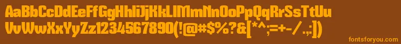 Mikodacs Font – Orange Fonts on Brown Background