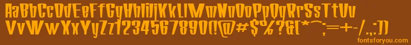 フォントSanasoftCorona.Kz – オレンジ色の文字が茶色の背景にあります。