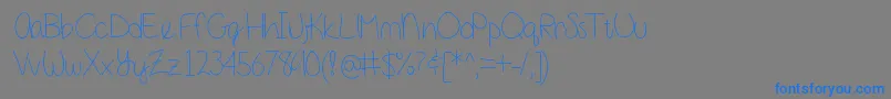 Girlnextdoor-fontti – siniset fontit harmaalla taustalla
