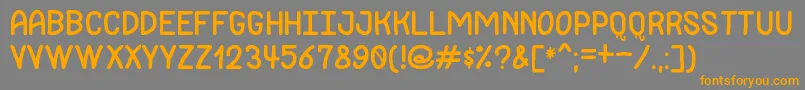 JackdawsLoveSt-Schriftart – Orangefarbene Schriften auf grauem Hintergrund
