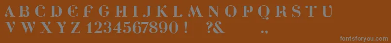 フォントDottydotbg – 茶色の背景に灰色の文字