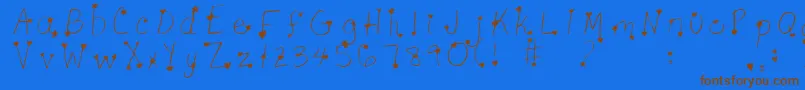 Starcros Font – Brown Fonts on Blue Background