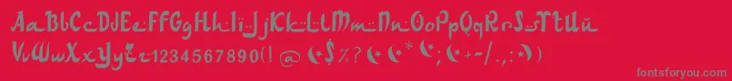 フォントArabdances – 赤い背景に灰色の文字
