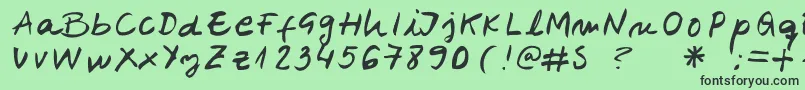 フォントBelenpison – 緑の背景に黒い文字