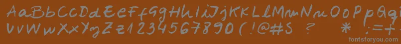 フォントBelenpison – 茶色の背景に灰色の文字