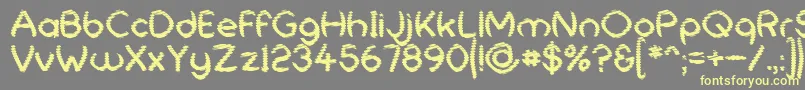 UniversalShatter Font – Yellow Fonts on Gray Background