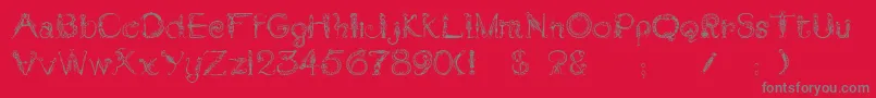 Tarantella Font – Gray Fonts on Red Background