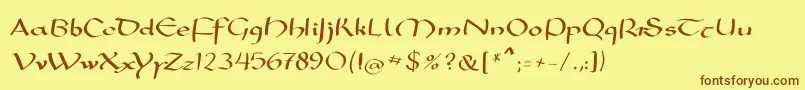 フォントMkarolingish – 茶色の文字が黄色の背景にあります。