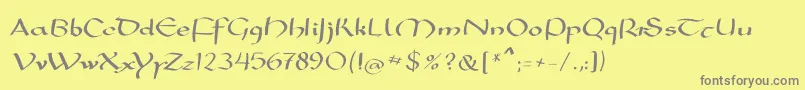 Mkarolingish-fontti – harmaat kirjasimet keltaisella taustalla