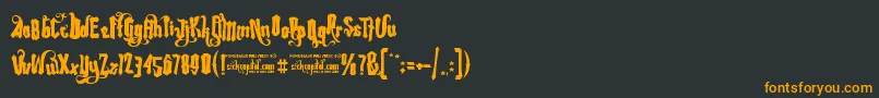 フォントRebelPixyBouncyFree – 黒い背景にオレンジの文字