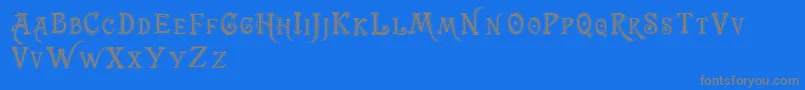 Trashbarusa-fontti – harmaat kirjasimet sinisellä taustalla