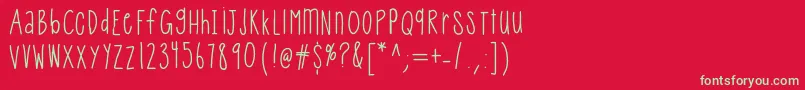 Helloqueenie Font – Green Fonts on Red Background