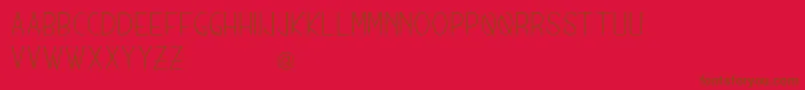 Fonte MunichSans – fontes marrons em um fundo vermelho