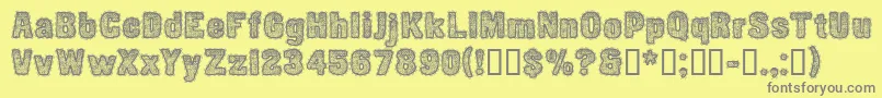 フォントCfetoffedupayspersonalReg – 黄色の背景に灰色の文字