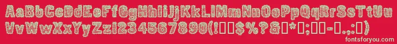 フォントCfetoffedupayspersonalReg – 赤い背景に緑の文字