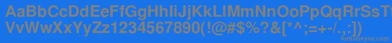 NimbussanlcyBold-fontti – harmaat kirjasimet sinisellä taustalla