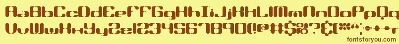 フォントSyndrome – 茶色の文字が黄色の背景にあります。