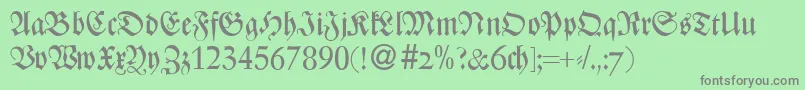 ZenturydbBold-Schriftart – Graue Schriften auf grünem Hintergrund