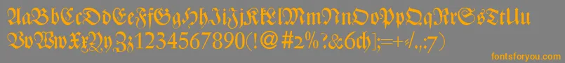フォントZenturydbBold – オレンジの文字は灰色の背景にあります。
