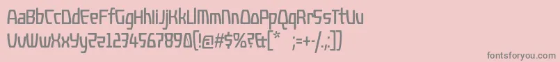 フォントKompressor – ピンクの背景に灰色の文字