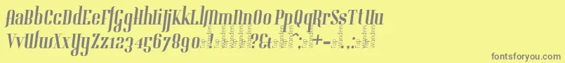 フォントGladifilthefte – 黄色の背景に灰色の文字