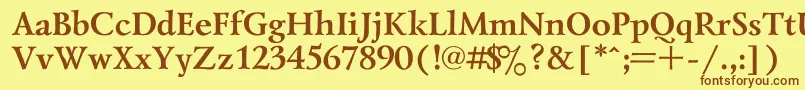 フォントLazursk1 – 茶色の文字が黄色の背景にあります。