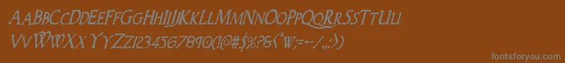 Woodgodcondital-Schriftart – Graue Schriften auf braunem Hintergrund