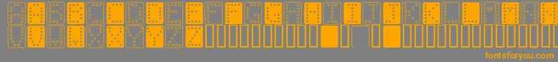 フォントDominoBred – オレンジの文字は灰色の背景にあります。